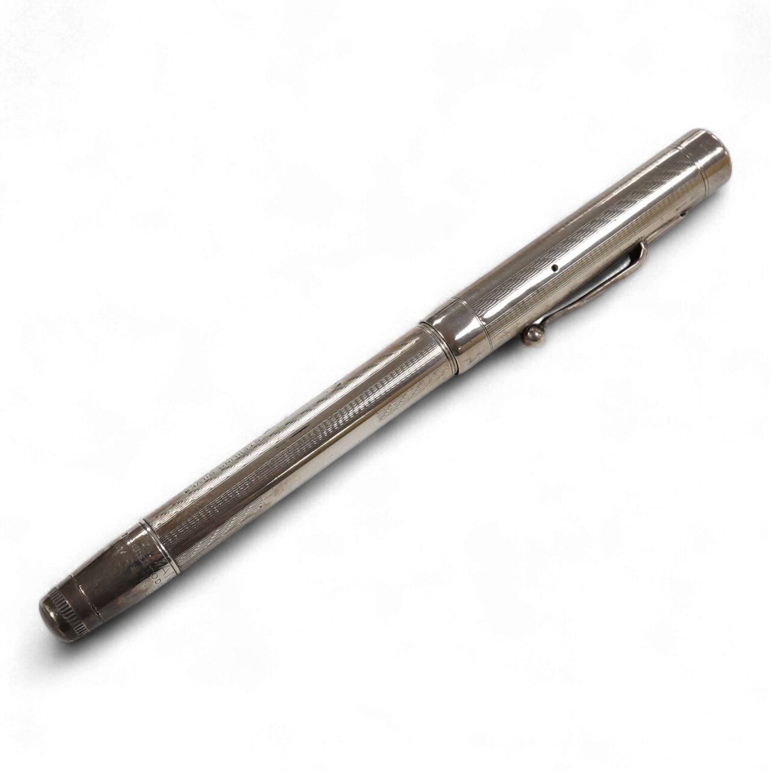 A Mabie Todd & Co. Swan Sterling silver twist filler, Made in England with 14ct. gold nib